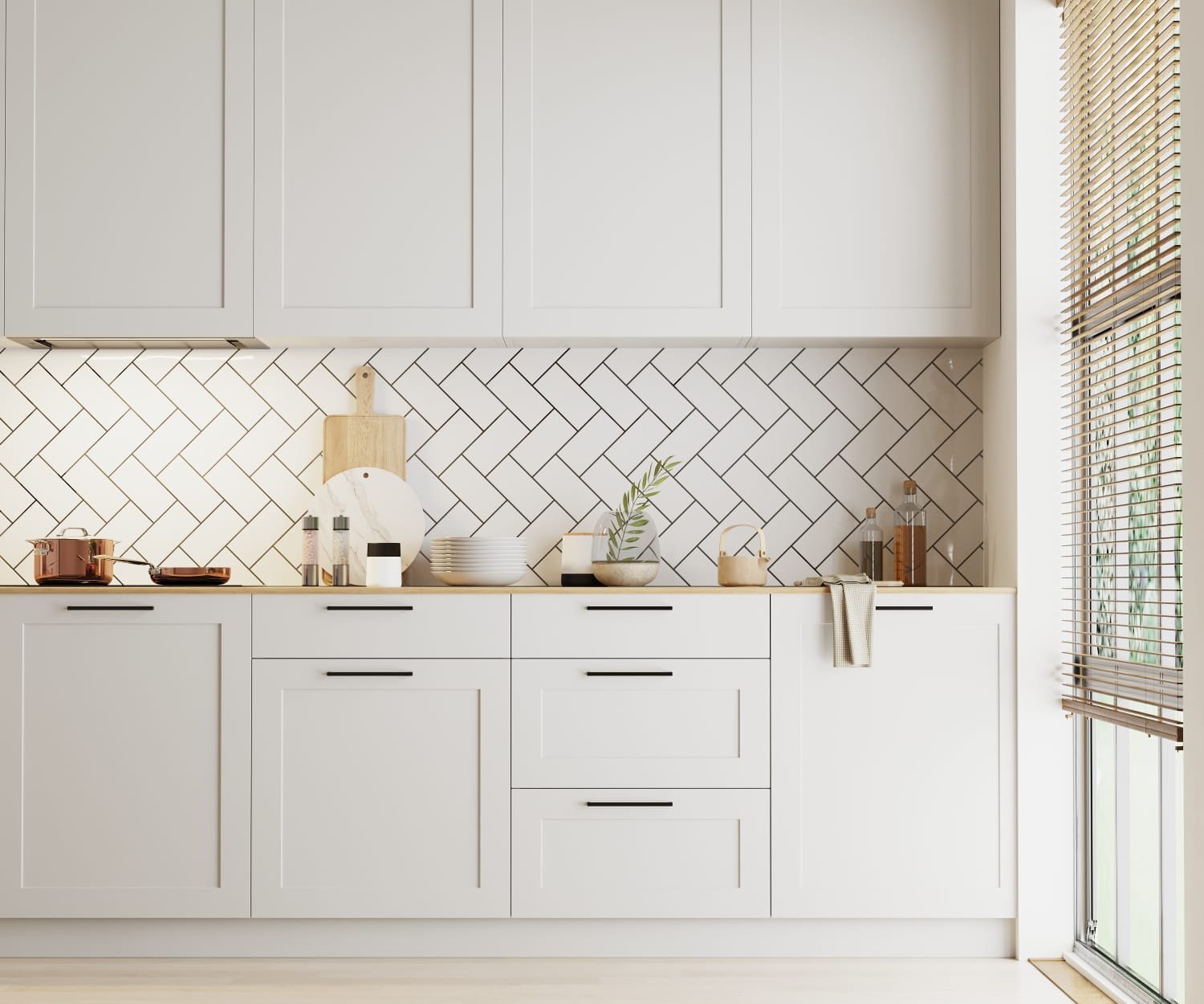 A repainted kitchen with white shaker-style cabinet doors